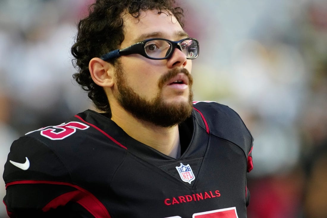 Why does Rodrigo Blankenship wear glasses during Colts games