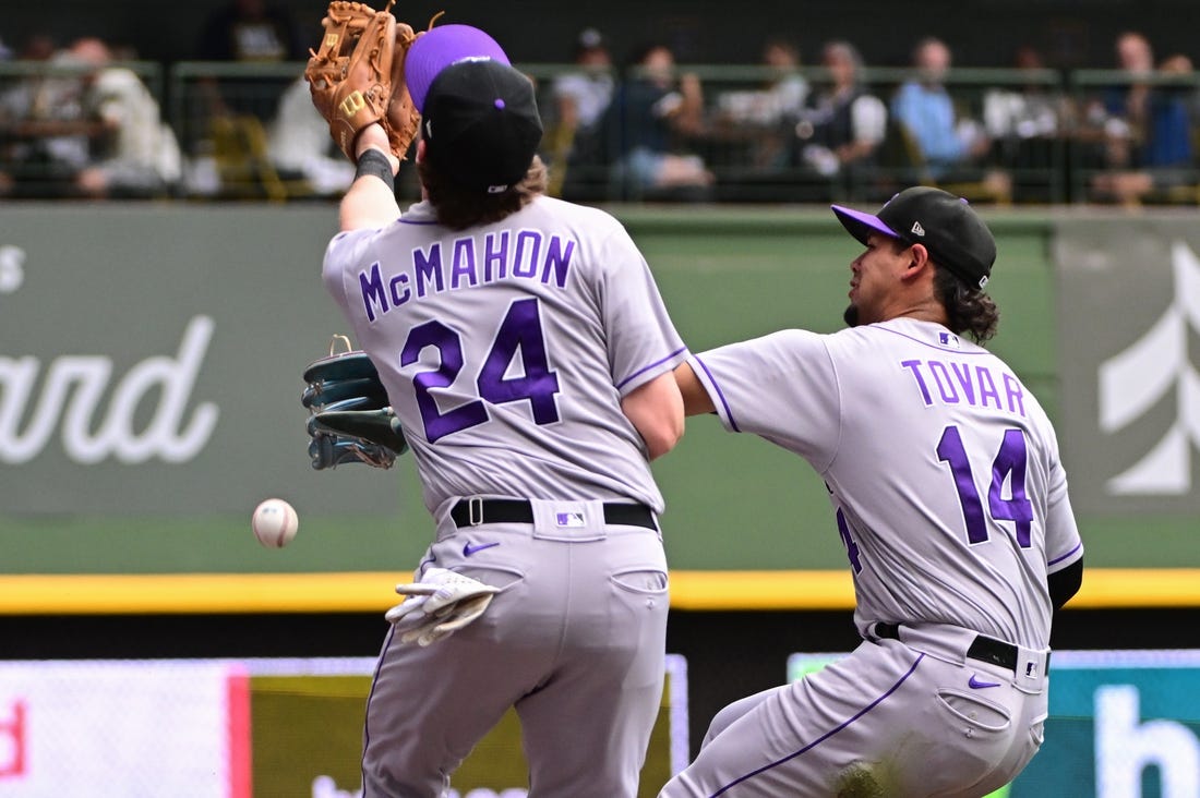 Images from the Milwaukee Brewers' 7-6 win over the Colorado Rockies