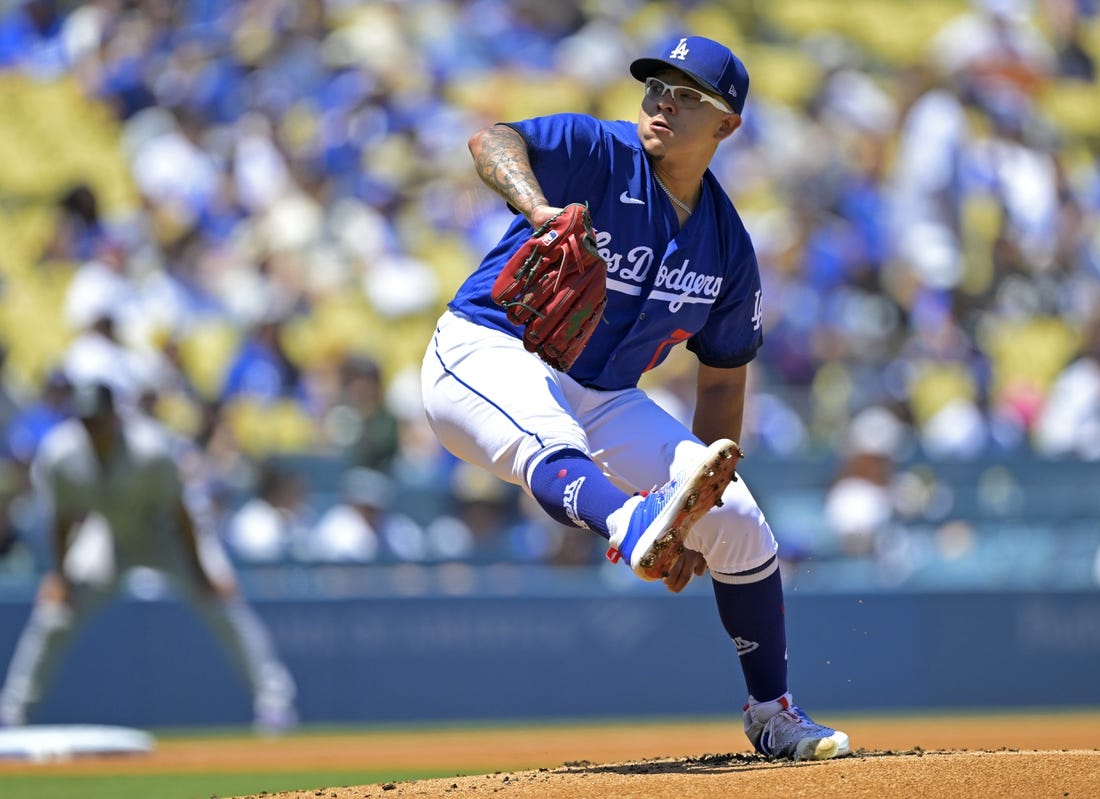 Miguel Rojas, Julio Urias help Dodgers finish 4-game sweep of