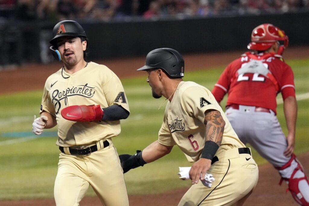 Consecutive home runs lead Reds to victory over Diamondbacks