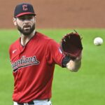 Dodgers endure long rain delay to earn win over Nats