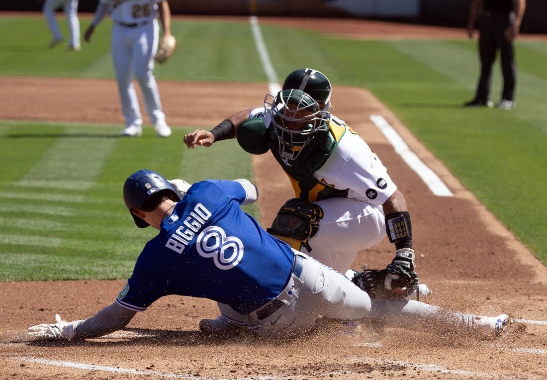 A's stunt Blue Jays' playoff push with 5-2 win