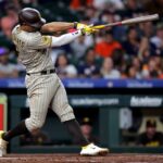 Dodgers endure long rain delay to earn win over Nats