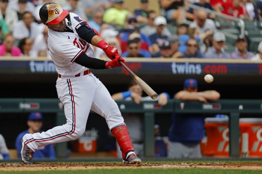 Kyle Farmer smashes a two-run homer, extending the Twins' lead