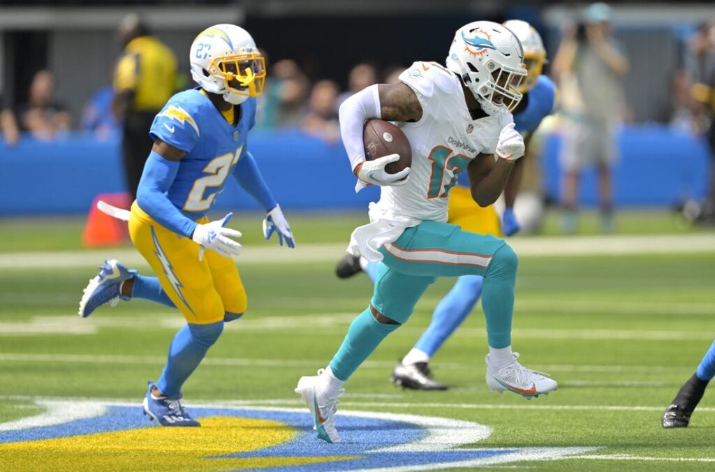 Tyreek snags game-winner as Dolphins outlast Chargers. See photos