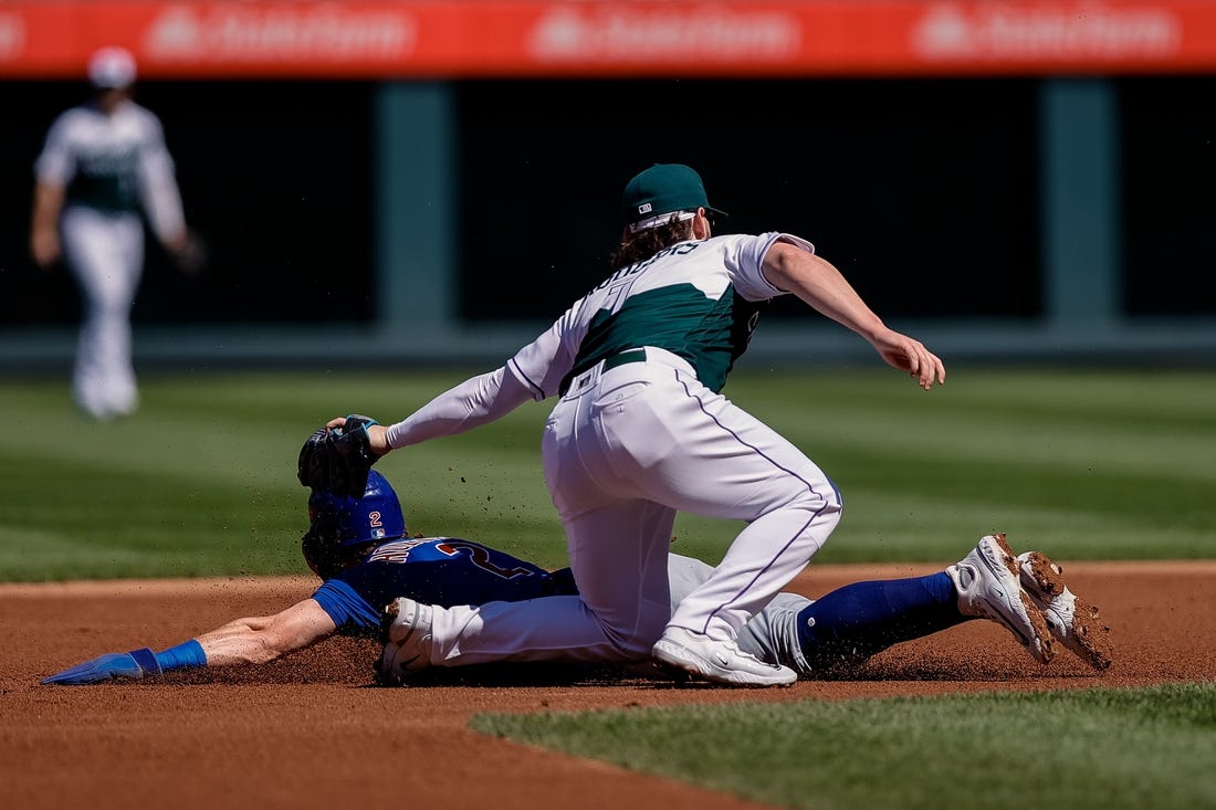 Four homers rally Rockies past Cubs, 7-3