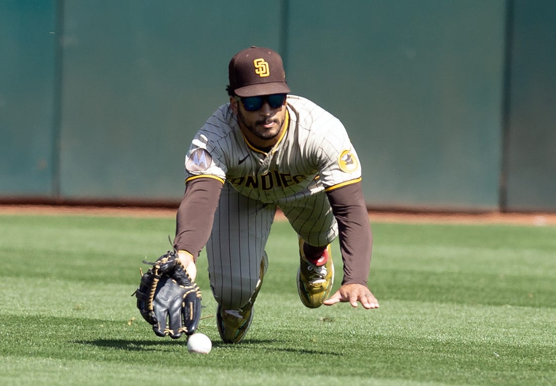 Padres edge A's, give rookie hurler first major league win