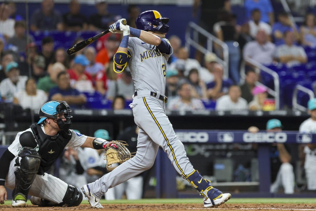 Brewers score 12 runs in one inning, crush Marlins 16-1