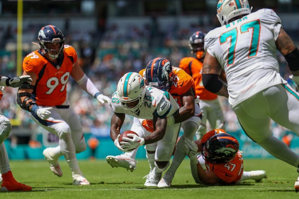 Miami Dolphins defeat Denver Broncos 70-20 in their first home