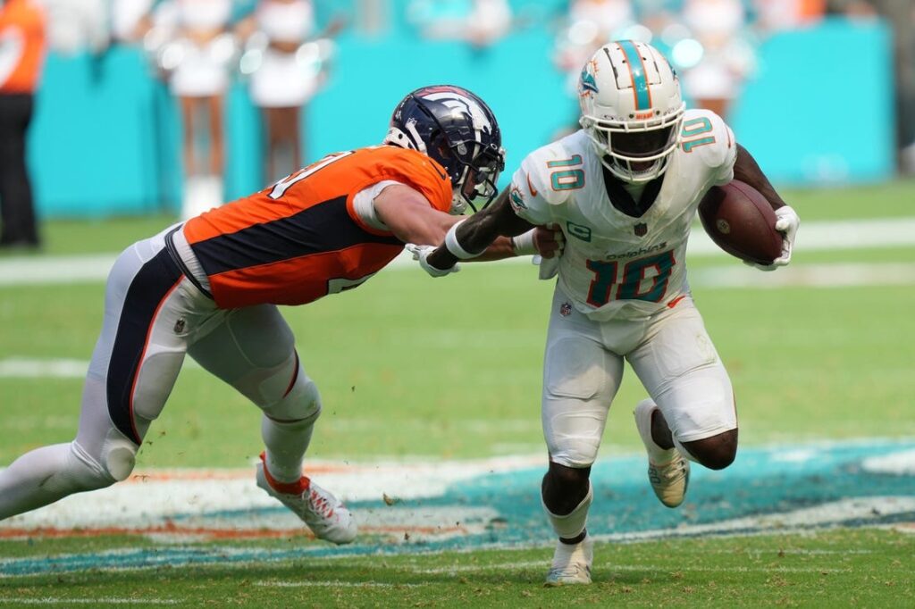 NFL roundup: Dolphins score 70 points in routing Broncos - Field Level  Media - Professional sports content solutions