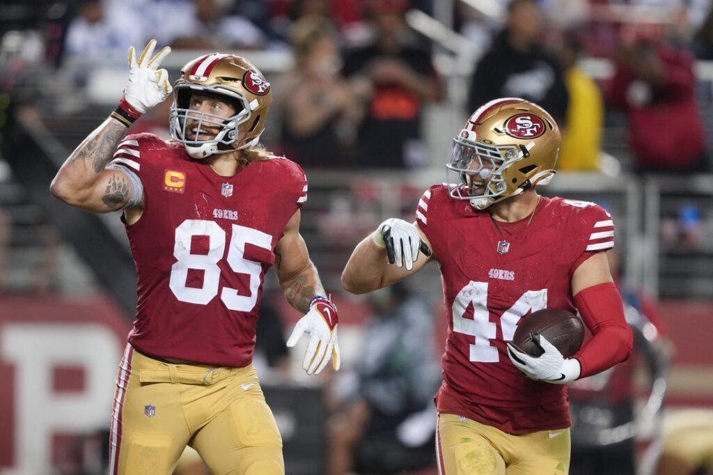 San Francisco 49ers tight end George Kittle and Minnesota Vikings