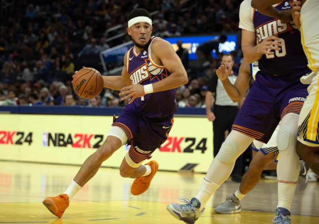Devin Booker, Suns slide by Warriors to open season Field Level Media