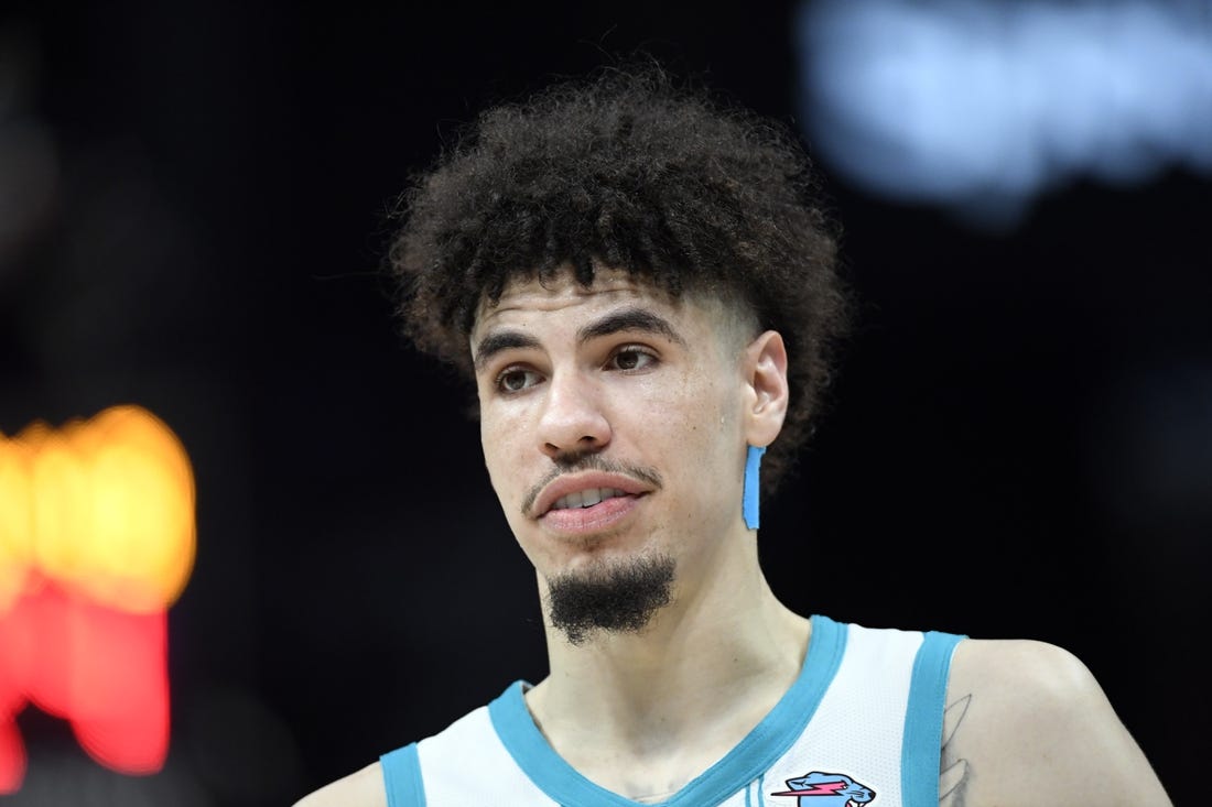 G LaMelo Ball helped off with right ankle injury Field Level