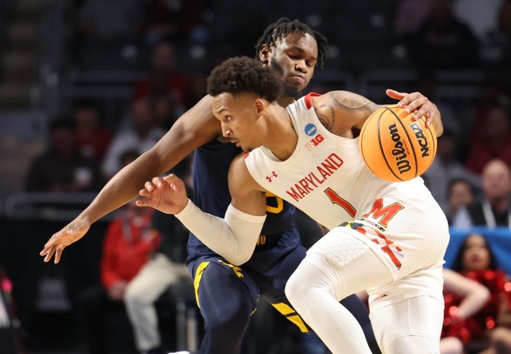 Jahmir Young dribbles
