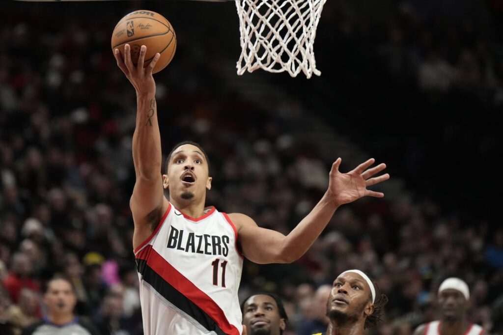 Malcolm Brogdon shoots