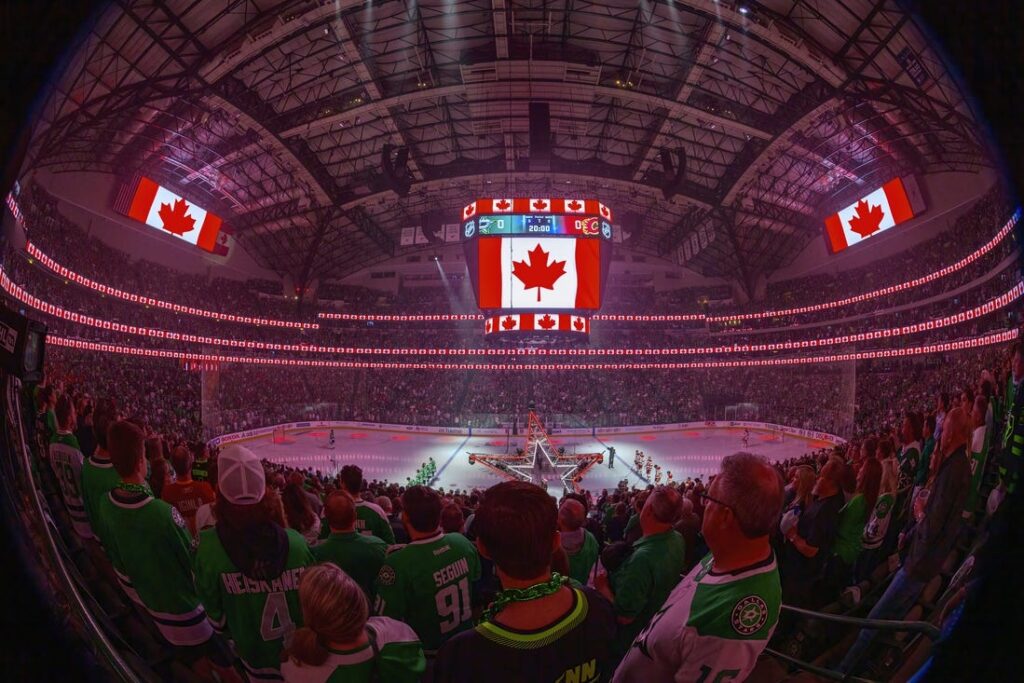 A view of the Canadian flag during the playing of the national anthem