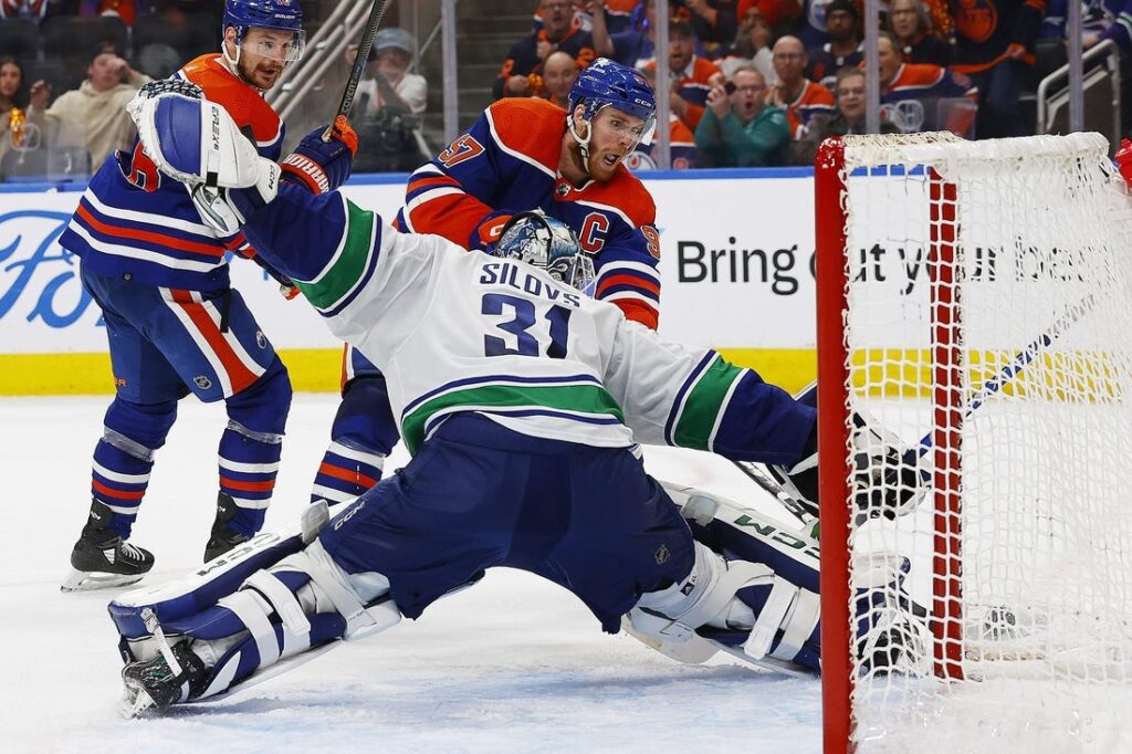 Oilers, Canucks