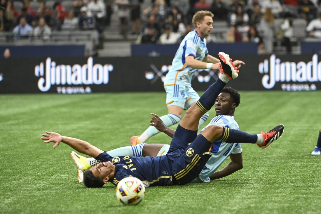 Whitecaps score in closing minutes to edge Rapids Field Level Media