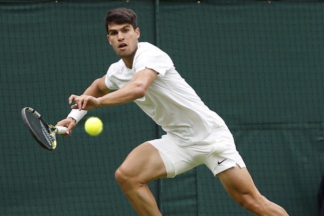 Carlos Alcaraz tops Frances Tiafoe in 5-set Wimbledon battle - Field ...