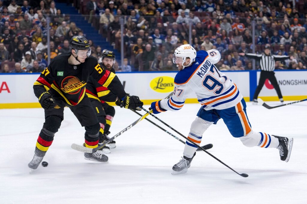 oilers canucks