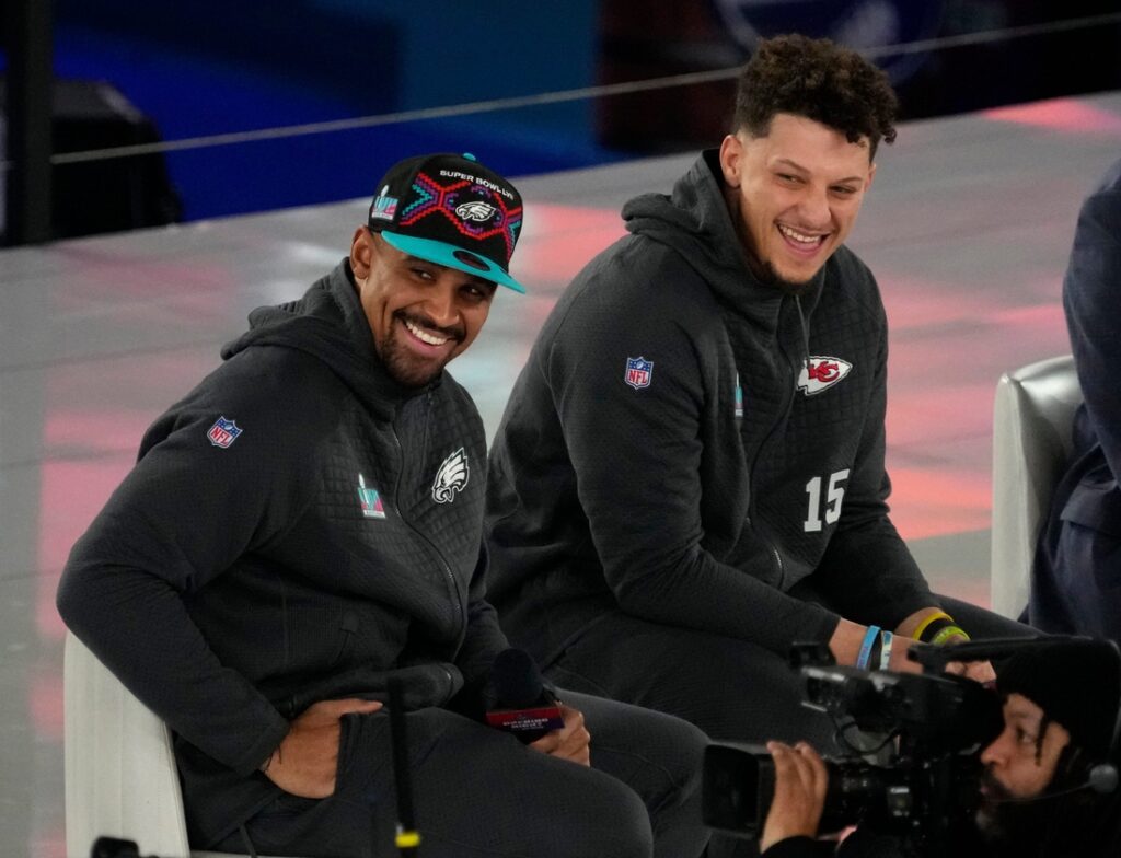 mahomes holding super bowl trophy