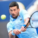 Novak Djokovic hits