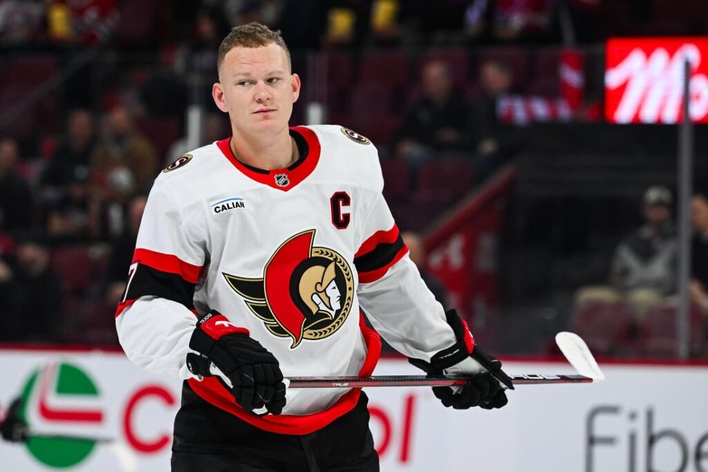 brady tkachuk warm