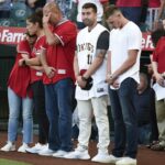 The family of Tyler Skaggs stands