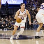 Collin Gillespie dribbles