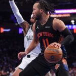 Jalen Brunson dribbles