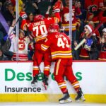 Flames celebrate
