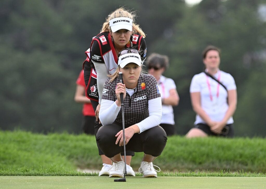 Brooke Henderson caddie