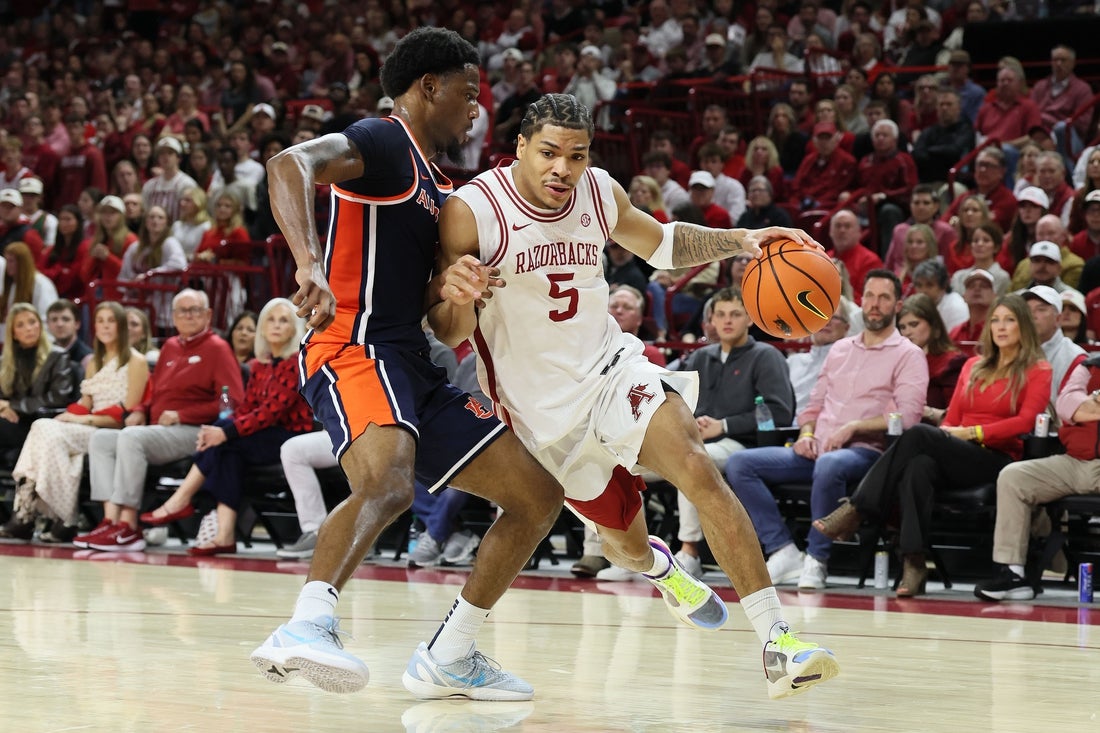 Career efforts from pair lift No. 21 Arkansas past Auburn