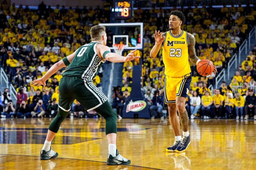 No. 3 Michigan bests No. 8 Michigan St. to finish Big Ten slate 19-1