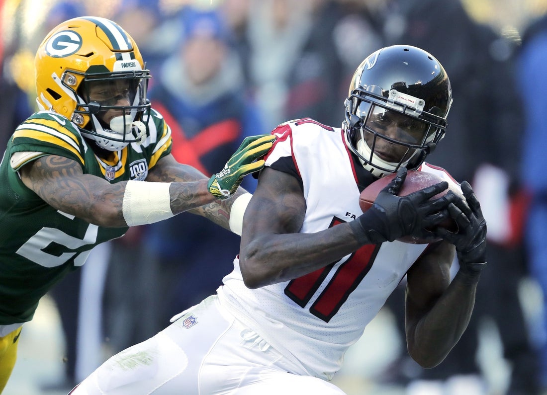 Atlanta Falcons wide receiver Julio Jones (11) pulls down a reception against Green Bay Packers cornerback Jaire Alexander (23) Sunday, December 9, 2018, at Lambeau Field in Green Bay, Wis. The play was called back due to a penalty. Dan Powers/USA TODAY NETWORK-Wisconsin Apc Packvsfalcons 120918 0549 Djp