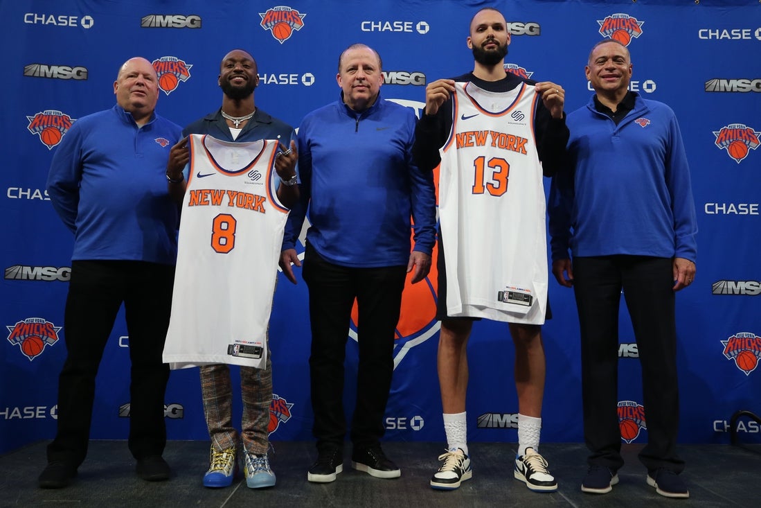 Aug 17, 2021; New York, New York, USA; New York Knicks guard Kemba Walker (8) and guard Evan Fournier (13) pose for a photo with team president Leon Rose (left) and head coach Tom Thibodeau (middle) and general manager Scott Perry (right) during their introductory press conference at Madison Square Garden. Mandatory Credit: Brad Penner-Imagn Images