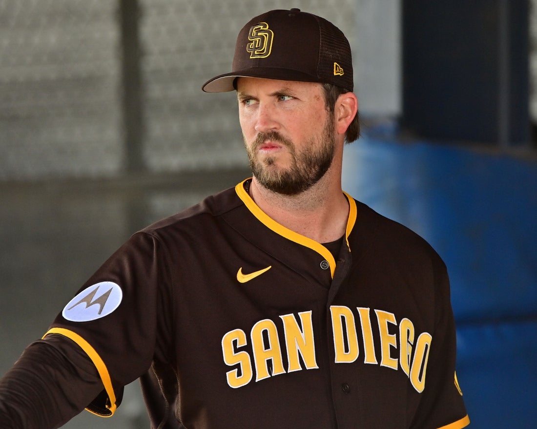 Feb 17, 2023; Glendale, AZ, USA; San Diego Padres starting pitcher Drew Pomeranz (15) looks on during a Spring Training workout at Peoria Sports Complex. Mandatory Credit: Matt Kartozian-Imagn Images