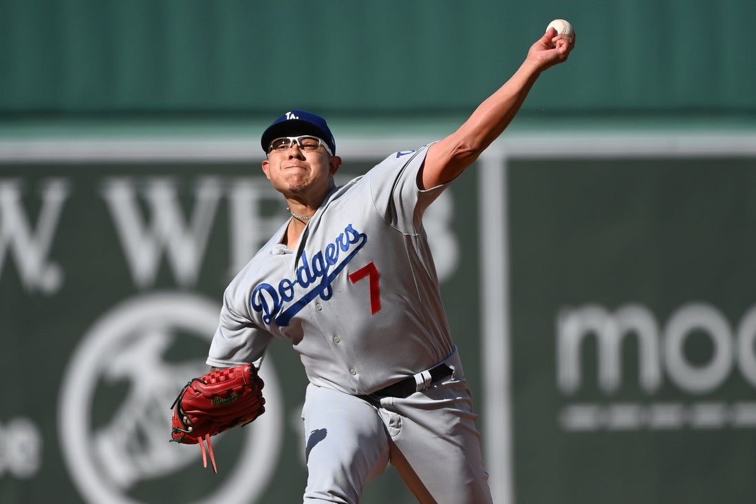 Aug 26, 2023; Boston, Massachusetts, USA; Los Angeles Dodgers starting pitcher Julio Urias (7) pitches during the first inning against the Boston Red Sox at Fenway Park. Mandatory Credit: Bob DeChiara-Imagn Images