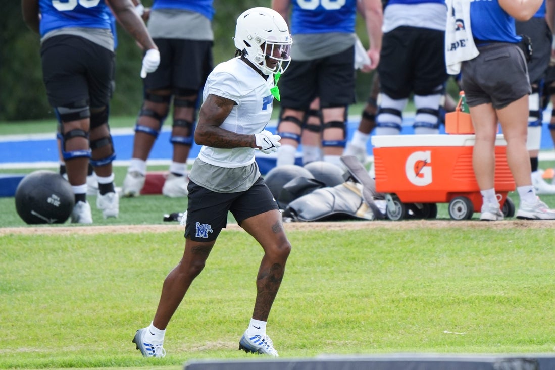 Memphis’ Kobee Minor (7) runs back after a drill during practice at the Billy J. Murphy Athletic Complex at the University of Memphis on Wednesday, July 31, 2024.