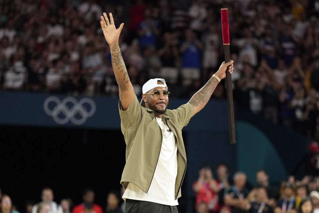 Aug 6, 2024; Paris, France; Carmelo Anthony performs before a men’s basketball quarterfinal game between the United States and Brazil during the Paris 2024 Olympic Summer Games at Accor Arena. Mandatory Credit: Kyle Terada-Imagn Images