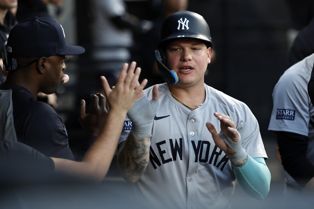 Aug 12, 2024; Chicago, Illinois, USA; New York Yankees outfielder Alex Verdugo (24) reacts in the dug out after scoring against the Chicago White Sox during the first inning at Guaranteed Rate Field. Mandatory Credit: Kamil Krzaczynski-Imagn Images