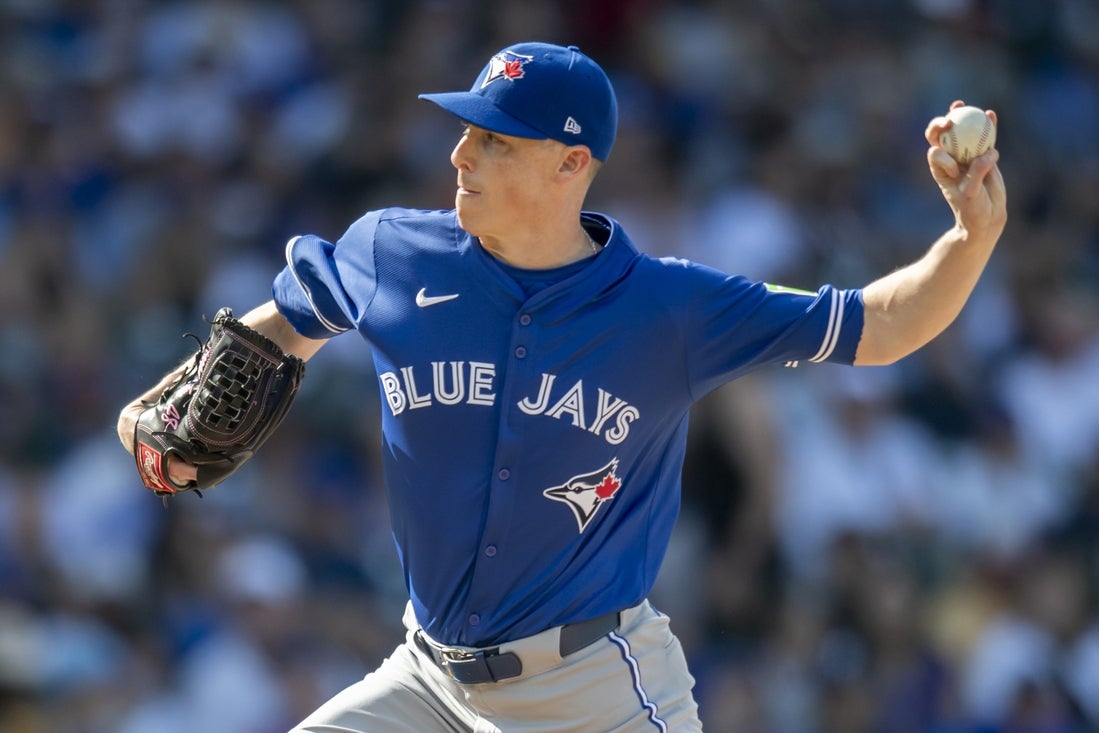 Aug 17, 2024; Chicago, Illinois, USA; Toronto Blue Jays relief pitcher Ryan Yarbrough (35) pitches during the seventh inning against the Toronto Blue Jays at Wrigley Field. Mandatory Credit: Patrick Gorski-Imagn Images
