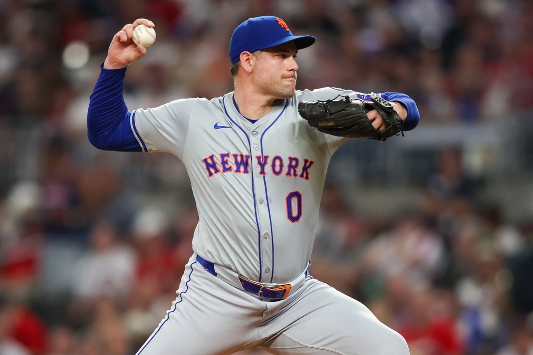 Sep 24, 2024; Atlanta, Georgia, USA; New York Mets relief pitcher Adam Ottavino (0) throws against the Atlanta Braves in the seventh inning at Truist Park. Mandatory Credit: Brett Davis-Imagn Images
