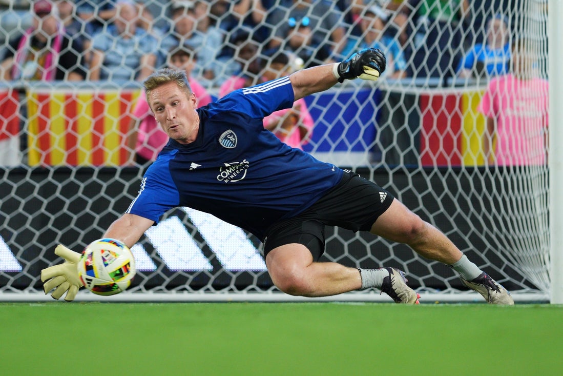 Oct 5, 2024; Kansas City, Kansas, USA; Sporting Kansas City goalkeeper Tim Melia (29) warms up before the match aagainst the LAFC at Children's Mercy Park. Mandatory Credit: Jay Biggerstaff-Imagn Images