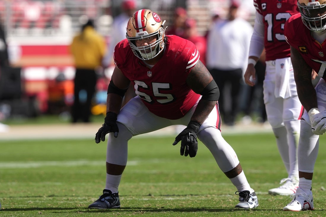 Oct 6, 2024; Santa Clara, California, USA; San Francisco 49ers guard Aaron Banks (65) during the second quarter against the Arizona Cardinals at Levi's Stadium. Mandatory Credit: Darren Yamashita-Imagn Images