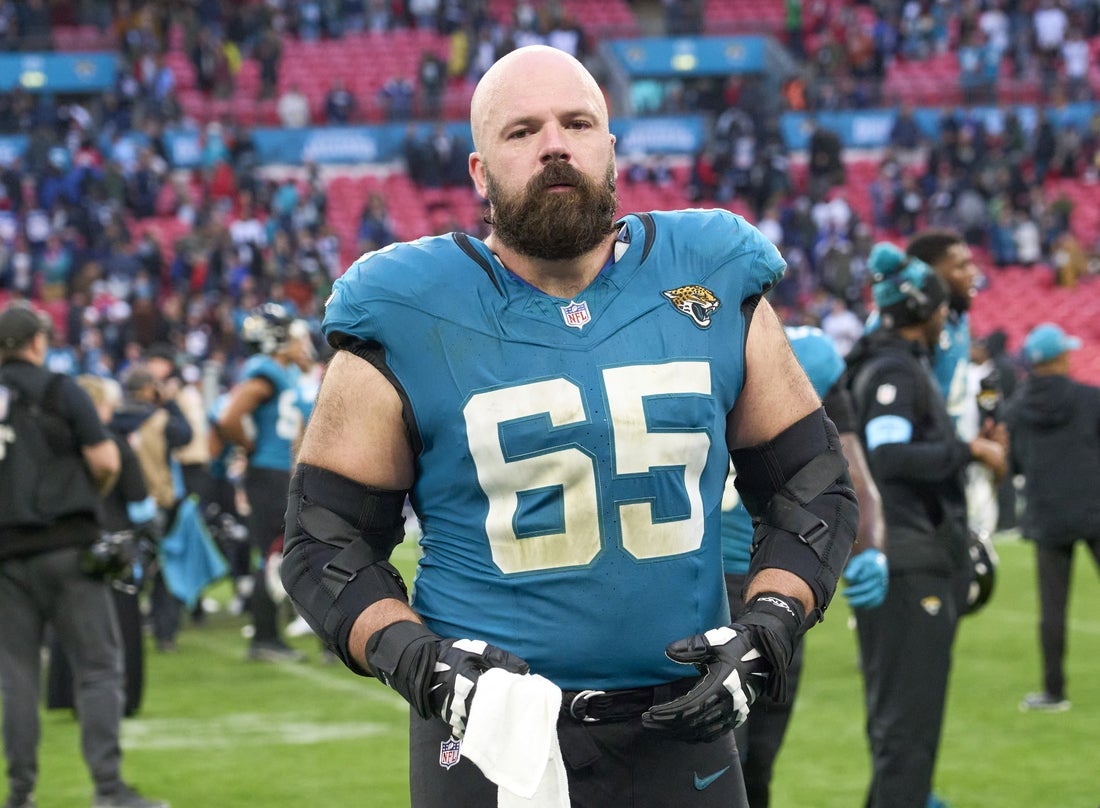 Oct 20, 2024; London, United Kingdom; Jacksonville Jaguars center Mitch Morse (65) leaves the field after an NFL International Series game at Wembley Stadium. Mandatory Credit: Peter van den Berg-Imagn Images