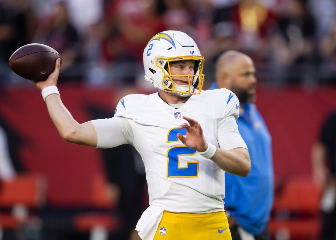 Oct 21, 2024; Glendale, Arizona, USA; Los Angeles Chargers quarterback Easton Stick (2) against the Arizona Cardinals at State Farm Stadium. Mandatory Credit: Mark J. Rebilas-Imagn Images