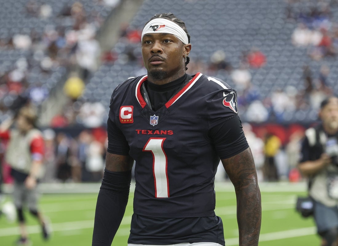 Oct 27, 2024; Houston, Texas, USA; Houston Texans wide receiver Stefon Diggs (1) walks towards the sideline before the game against the Indianapolis Colts at NRG Stadium. Mandatory Credit: Troy Taormina-Imagn Images