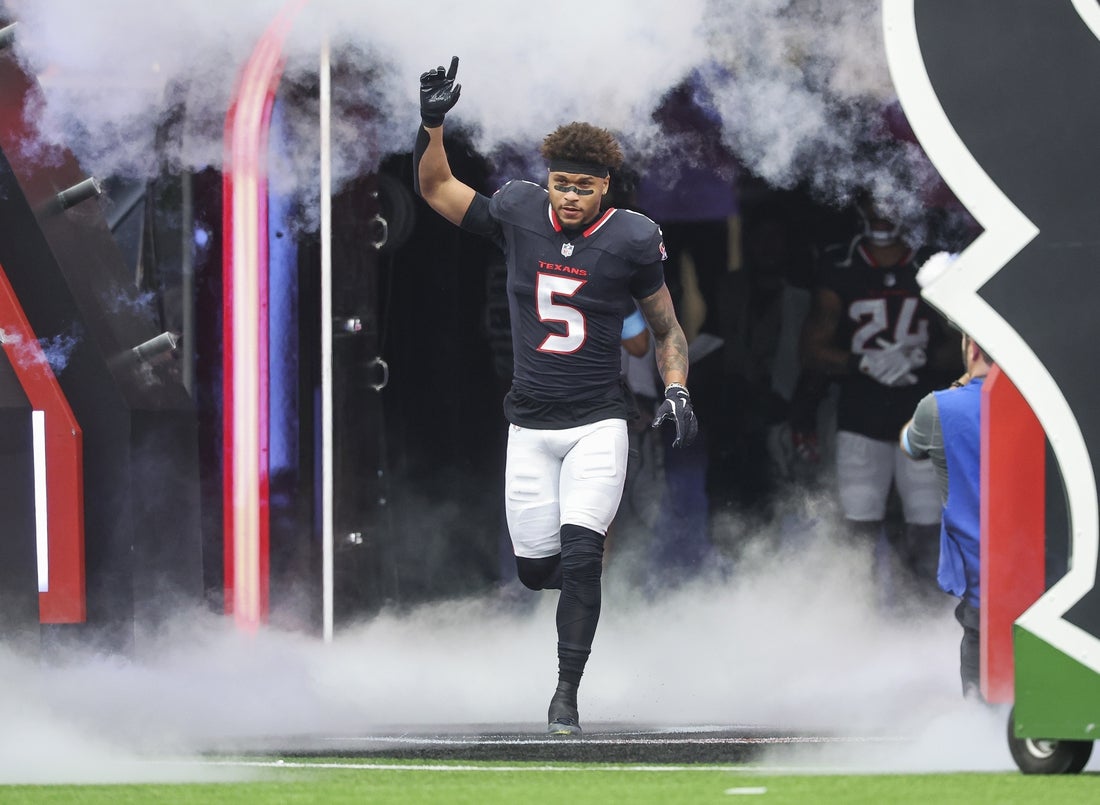 Oct 27, 2024; Houston, Texas, USA; Houston Texans safety Jalen Pitre (5) runs onto the field before the game against the Indianapolis Colts at NRG Stadium. Mandatory Credit: Troy Taormina-Imagn Images