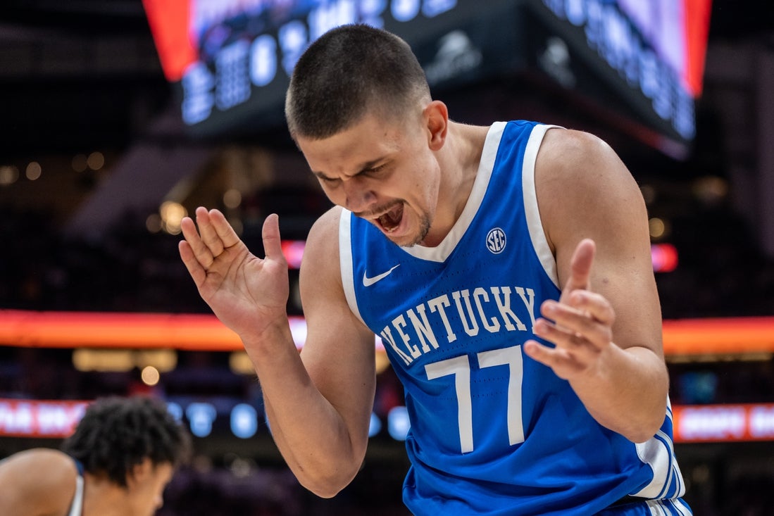 Dec 7, 2024; Seattle, Washington, USA; Kentucky Wildcats guard Kerr Kriisa (77) reacts during the first half against the Gonzaga Bulldogs at Climate Pledge Arena. Mandatory Credit: Stephen Brashear-Imagn Images
